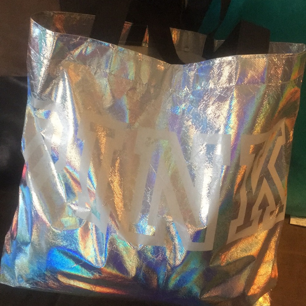 Pink duffel bag silver an white